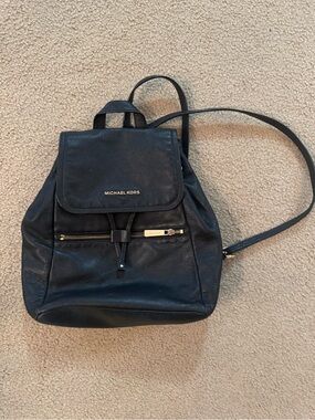 Michael Kors Black Pebbled Leather Drawstring Backpack with Gold Hardware